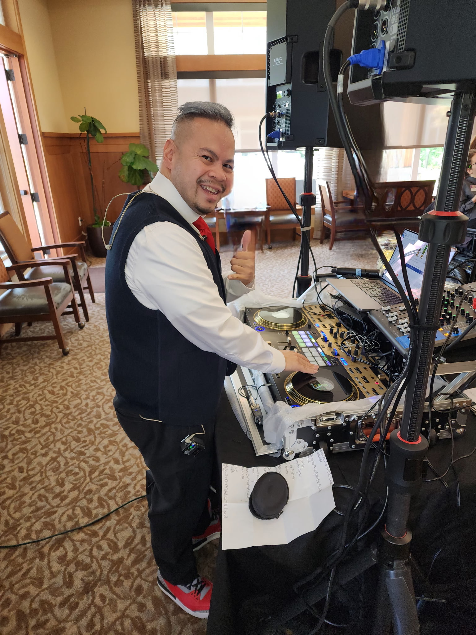 DJ Mikey working at turntables
